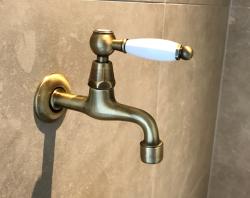 Grifo de lavabo PB classic mural con palanca blanca agua fría color bronce 1208853512