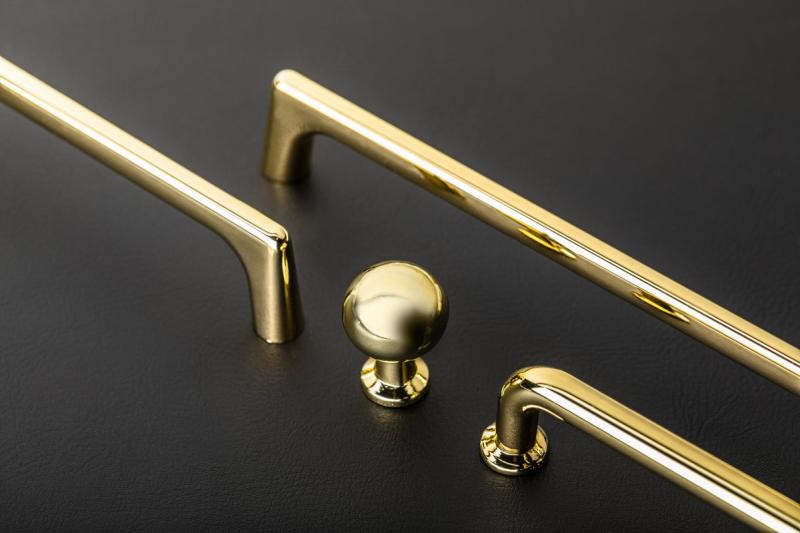 Manija de Zamak NORD C = 128 mm oro brillante 1208966144